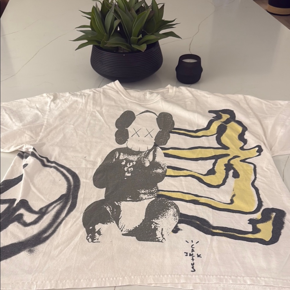 White Graphic T-Shirt with Black and Yellow Design